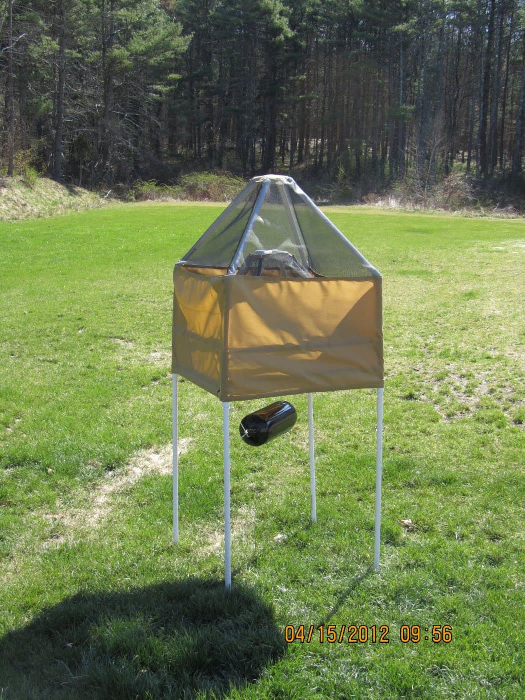Early Fly Cage prototype set up on a lawn during testing in 2012