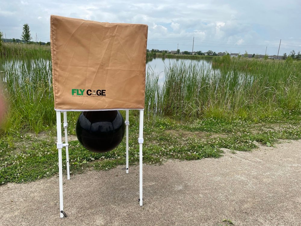 The Fly Cage set up beside a pond